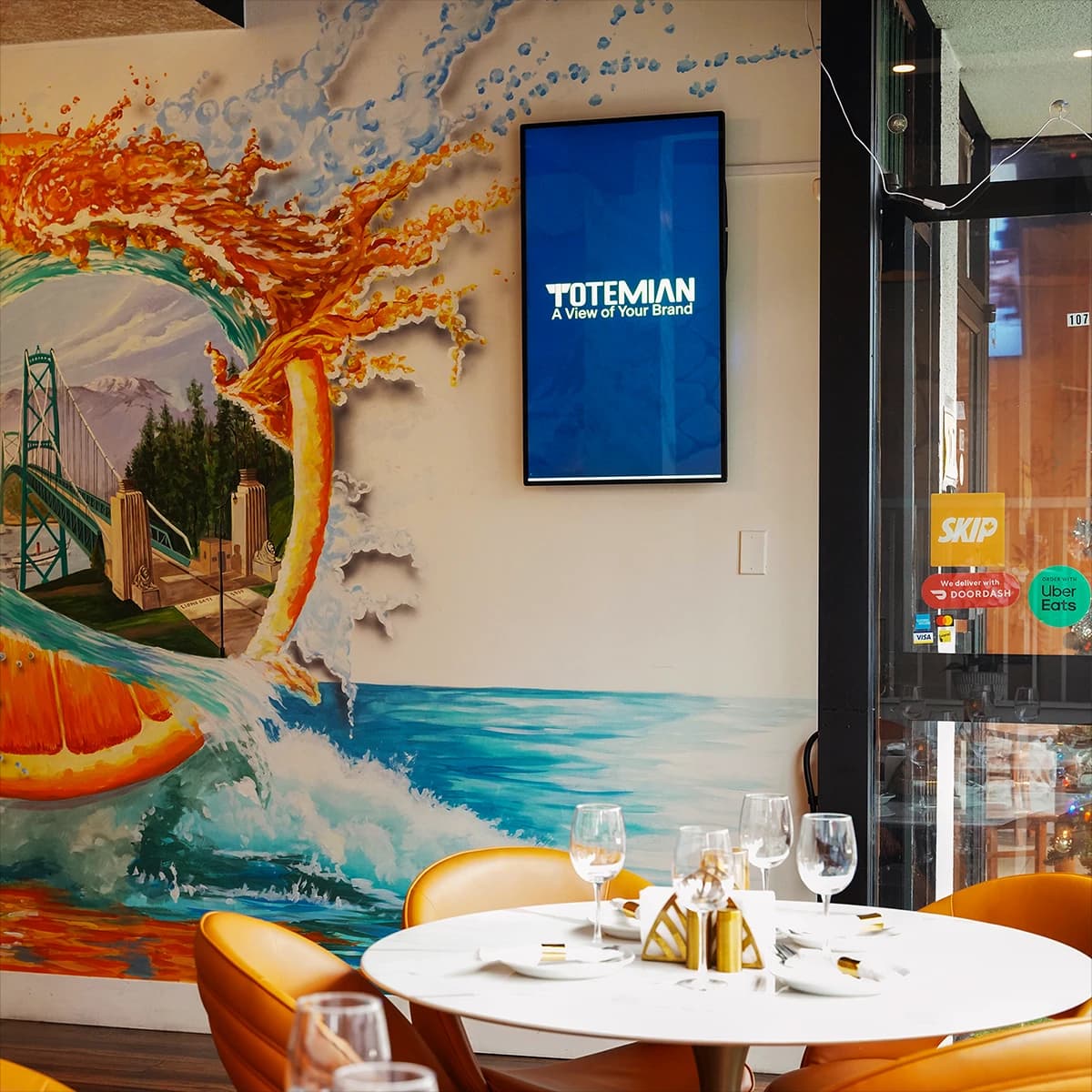 Totemian Vertical Brandboard displayed in a stylish cafe